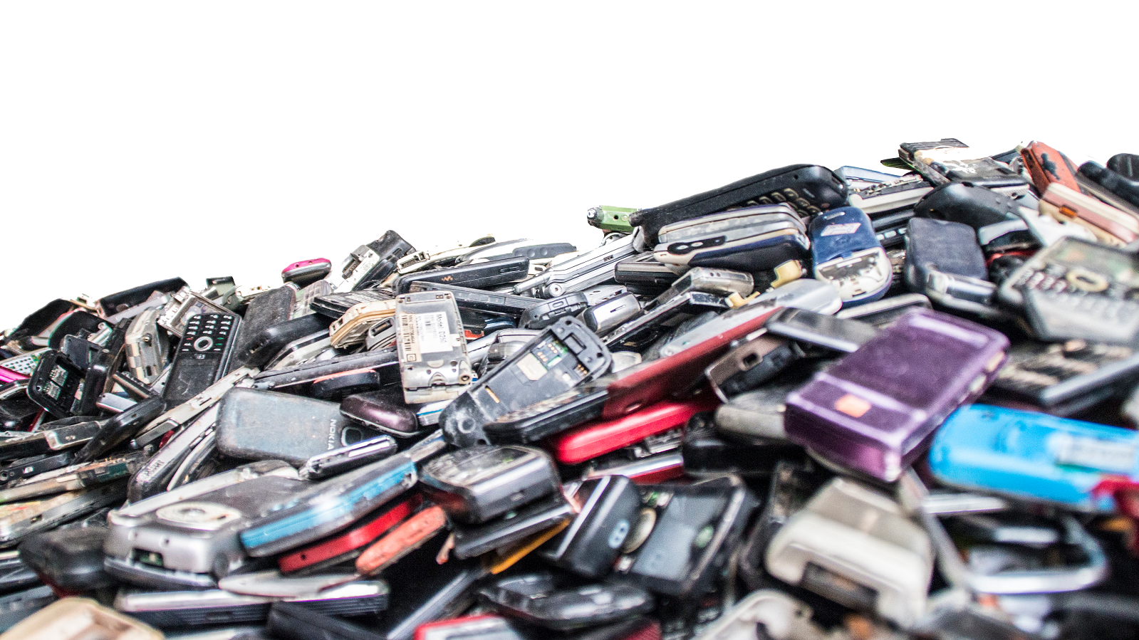 pile of discarded cell phones 